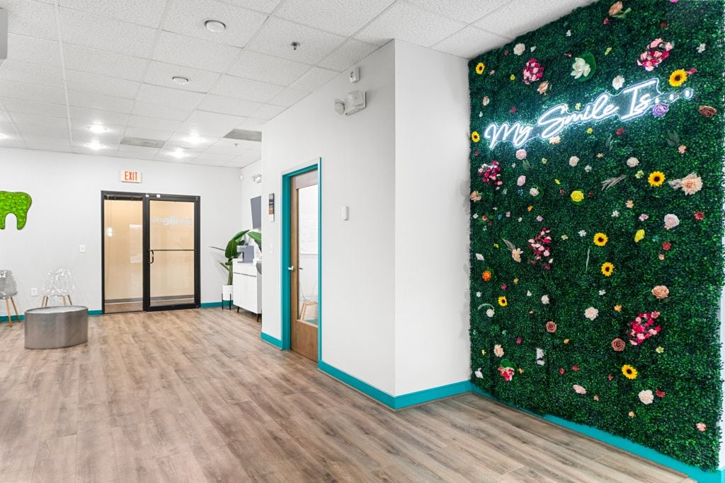 SmileHQ office with floral wall