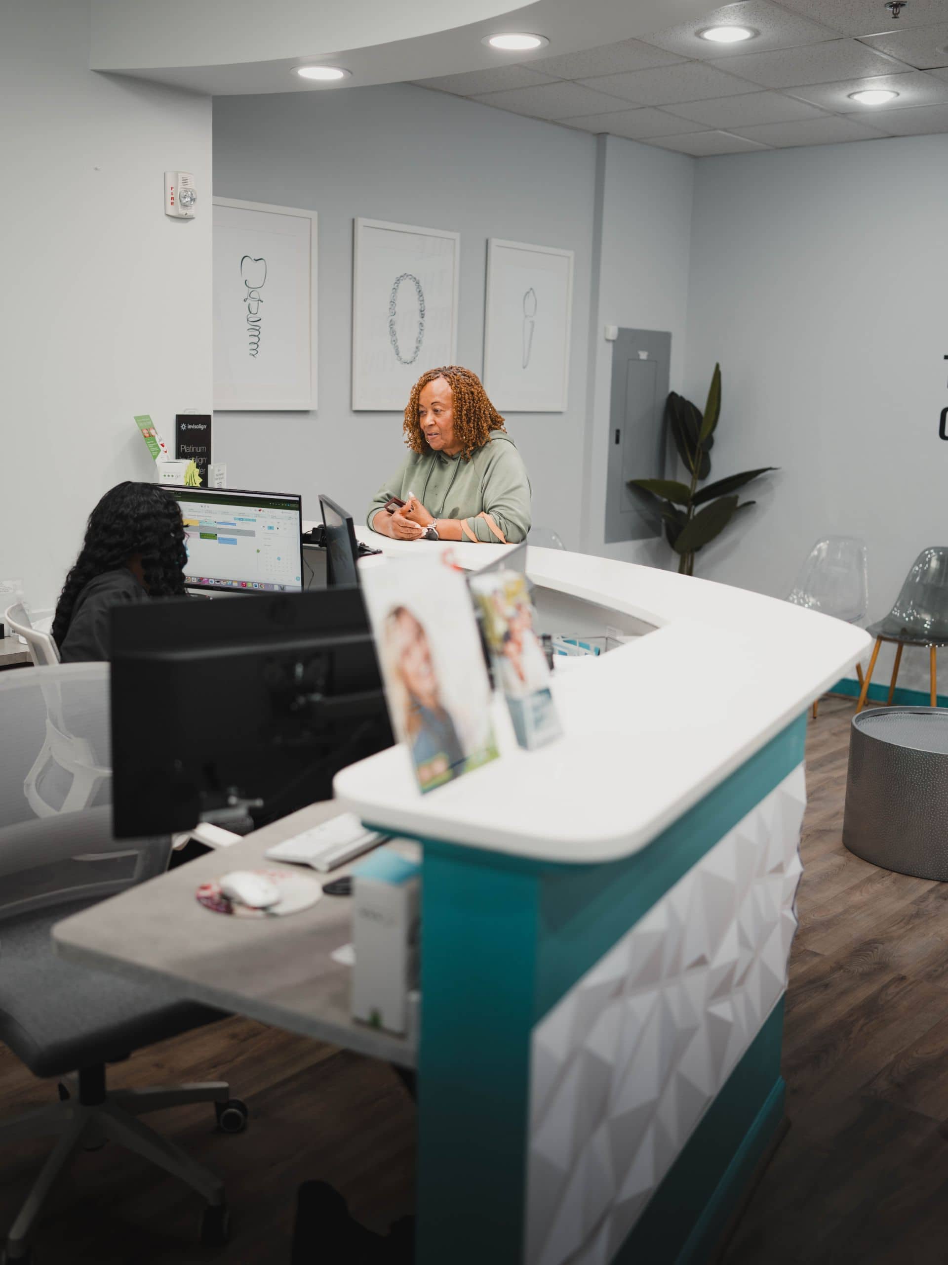 Woman getting help at front desk